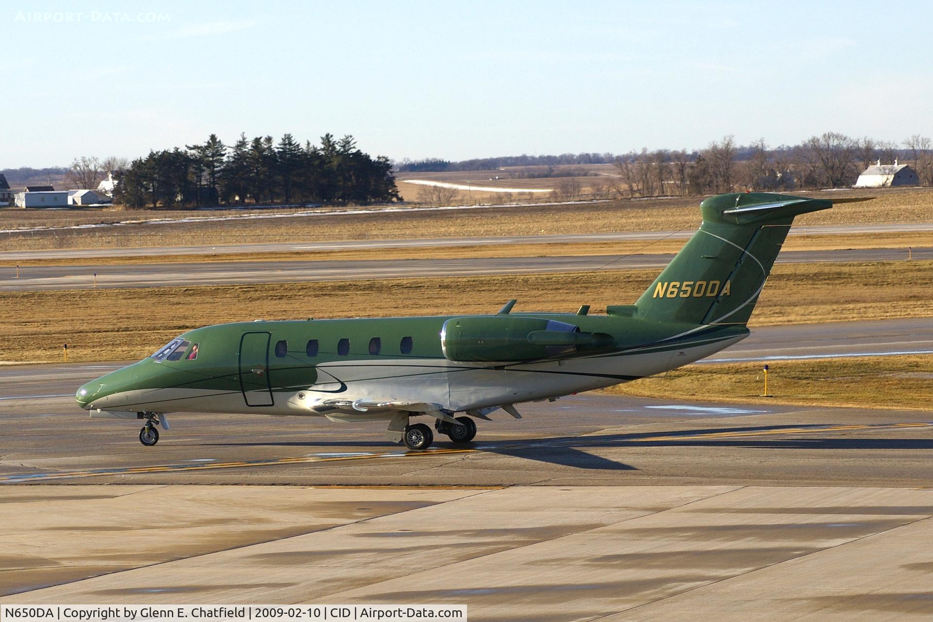 N650DA, 1986 Cessna 650 C/N 650-0114, Taxiing by my window on the way to Runway 27