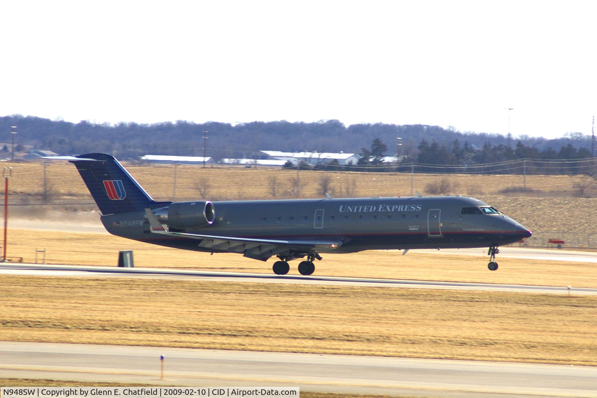 N948SW, 2003 Canadair CL-600-2B19 Regional Jet CRJ-200LR C/N 7789, Touching down on Runway 27