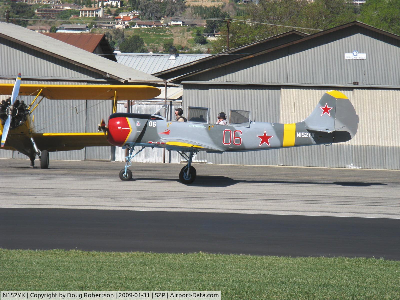 N152YK, 1995 Yakovlev Yak-52 C/N 9511815, 1995 Yakovlev YAK 52, Vedeneev (Ivchenko) M-14P 360 Hp radial, taxi to Rwy 04
