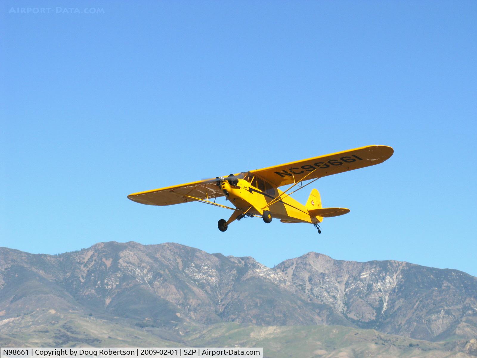 N98661, 1946 Piper J3C-65 Cub Cub C/N 18890, 1946 Piper J3C-65 CUB, Continental A&C75 75 Hp upgrade, takeoff climb Rwy 22