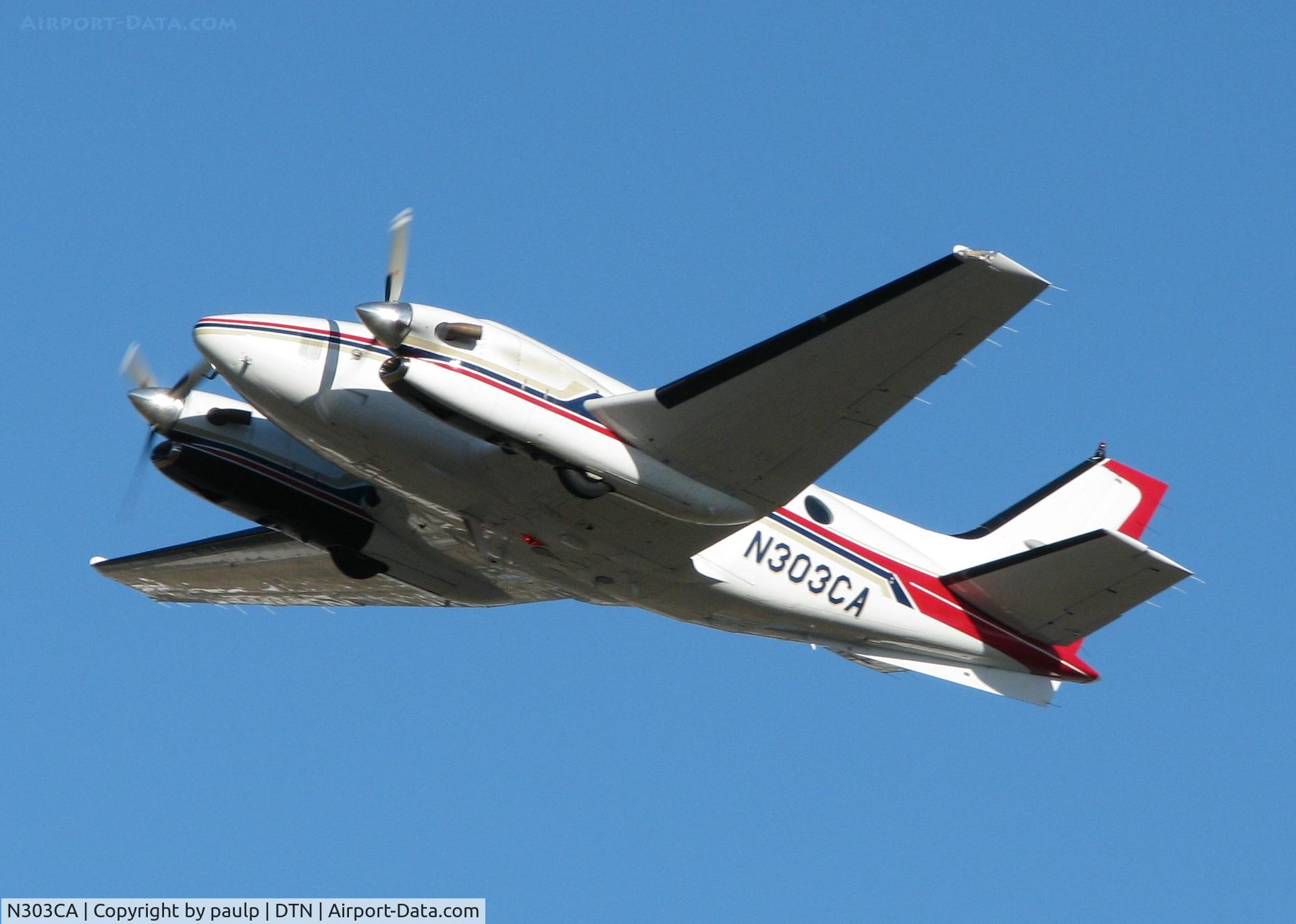 N303CA, 1986 Beech C90A King Air C/N LJ1134, Taking off from Downtown Shreveport.