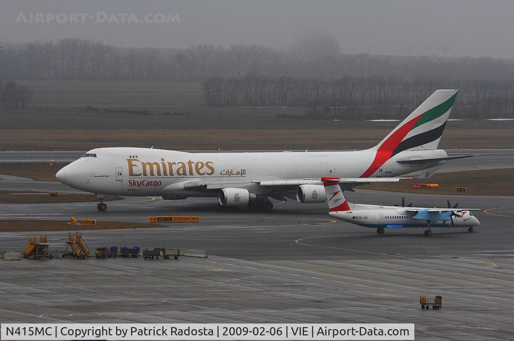 N415MC, 2002 Boeing 747-47UF C/N 32837, Visited Vienna in February 2009 for the delivery of a replacement engine for a T7 of Emirates