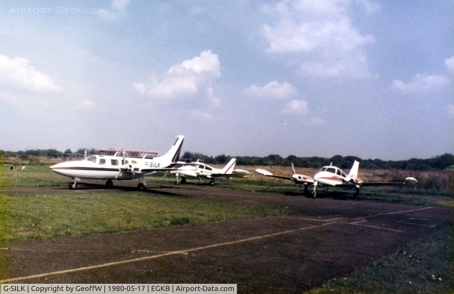 G-SILK, 1979 Piper PA-60-601P Aerostar C/N 61P06077963272, Parked with 2 Cessna 310's at the 1980 Air Fair