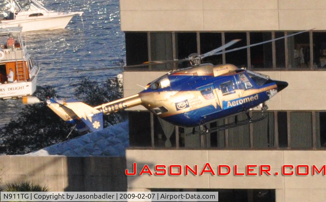 N911TG, 1993 Eurocopter-Kawasaki BK-117C-1 C/N 7506, Photo taken while landing at Tampa General Hospital 2/7/09.