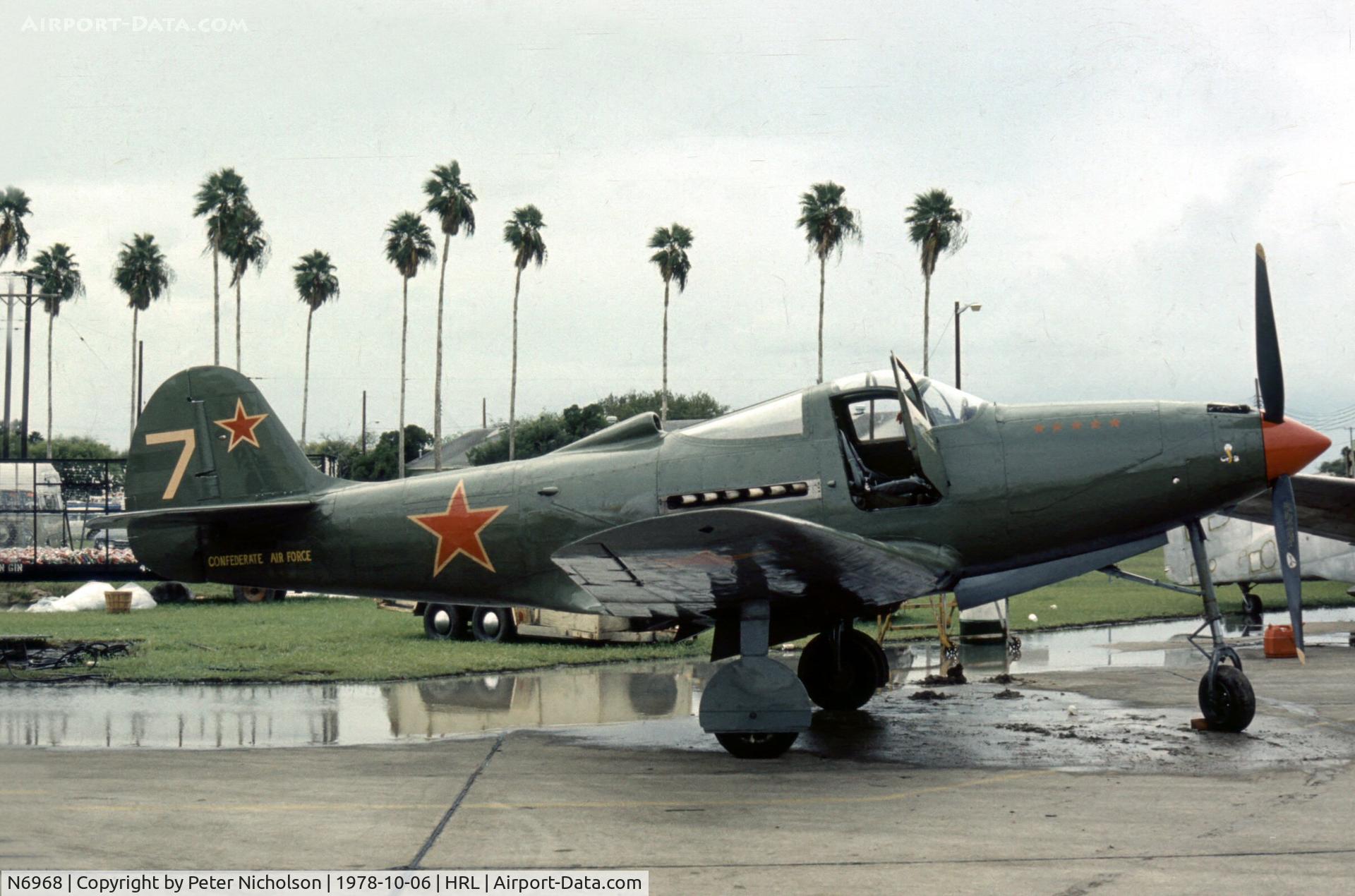 N6968, 1943 Bell P-39Q Airacobra C/N 219597, As NX6968 this P-39Q Airacobra 42-19597 of the Confederate Air Force was flown in a Russian colour scheme at their 1978 Airshow.
