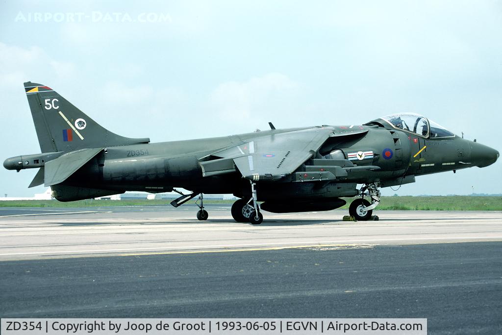 ZD354, 1988 British Aerospace Harrier GR.7 C/N P21, When the new generation Harrier was introduced 20[R] sqn was the first to operate this aircraft. Later this airframe was converted from Harrier GR.5 to Harrier GR.7, adding the distinctive bumps on the nose cone. Seen on the Brize Norton photo call.