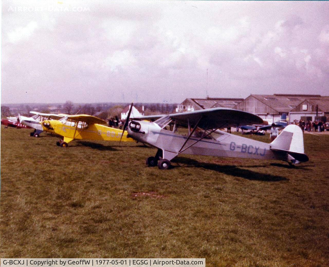 G-BCXJ, 1944 Piper L-4J Grasshopper (J3C-65D) C/N 13048, Taken at a well attended PFA fly-in at Stapleford in 1977