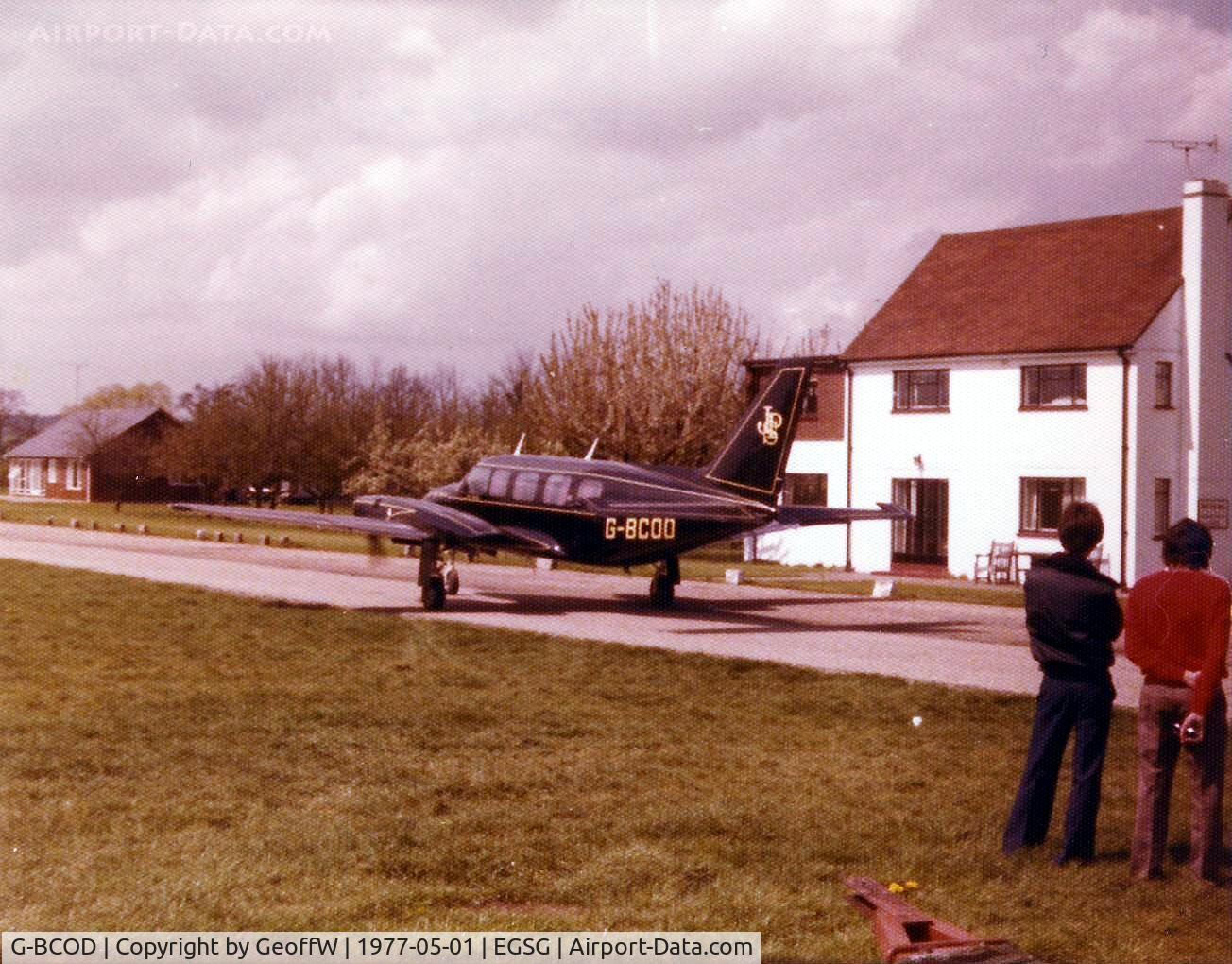 G-BCOD, 1974 Piper PA-31-350 Chieftain C/N 31-7405488, Owned by Lotus Cars. Taken at a well attended PFA fly-in at Stapleford in 1977