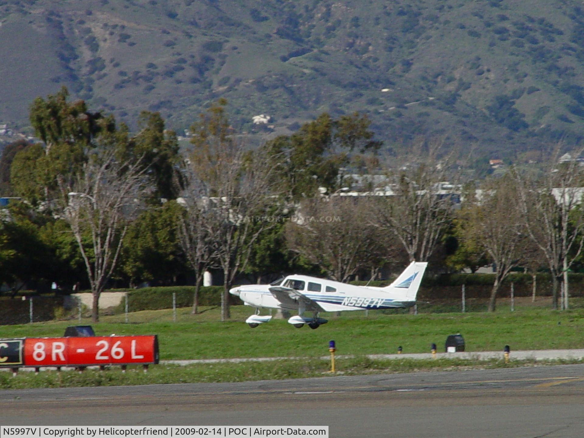 N5997V, 1977 Piper PA-28-181 Archer II C/N 28-7790515, Lifting off of 8R westbound