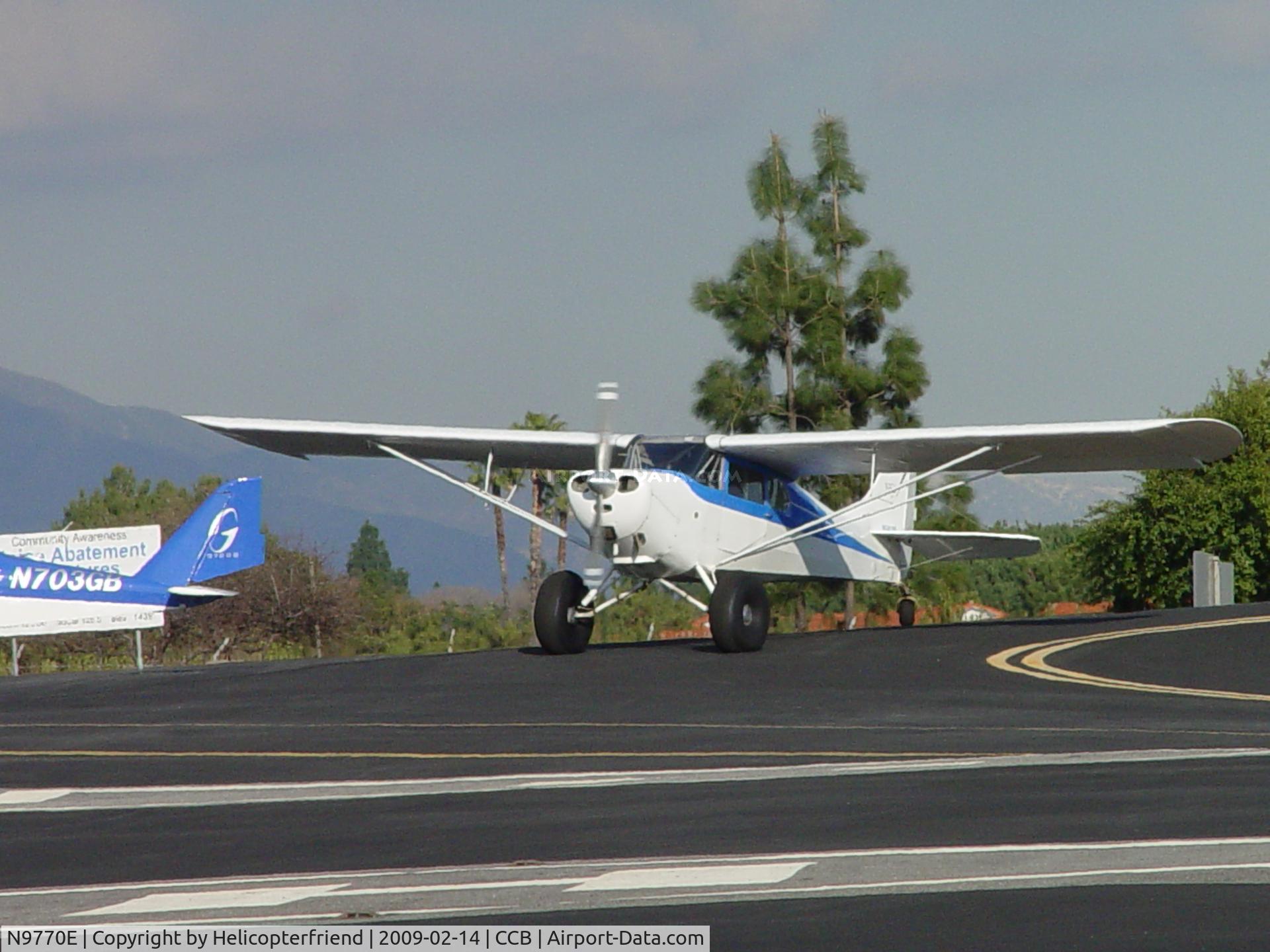 N9770E, 1946 Aeronca 11AC Chief C/N 11AC-1415, Waiting for a 2007 Aero (N703GB) to take off