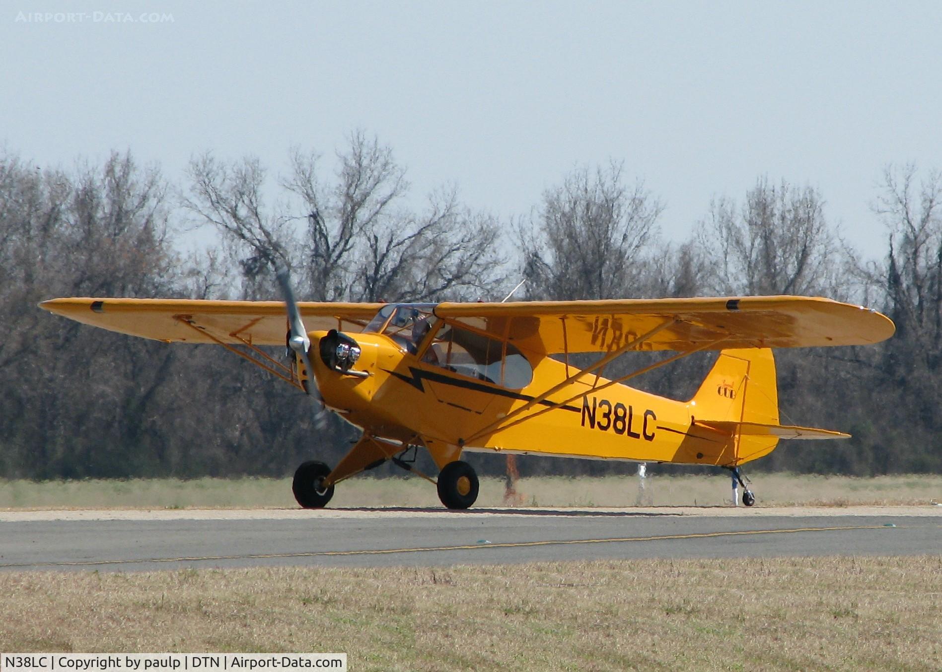 N38LC, 2008 American Legend AL3 C/N AL-1118, Taxiing across runway 14 at Downtown Shreveport.