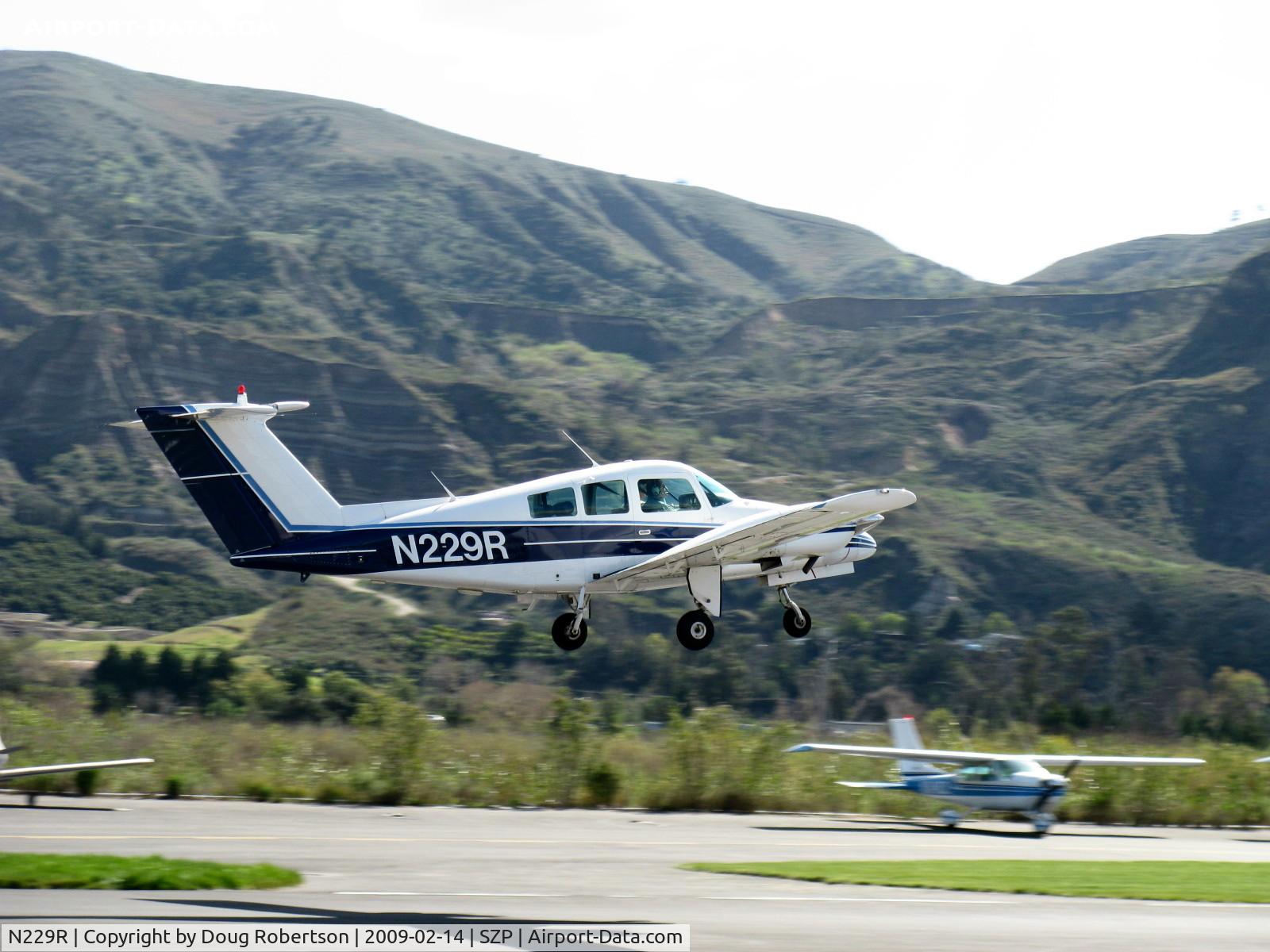 N229R, Beech 76 Duchess C/N ME-223, 1979 Beech 76 DUCHESS, two Lycoming O-360-A1G6D 180 Hp each, two blade CS props, takeoff climb Rwy 22