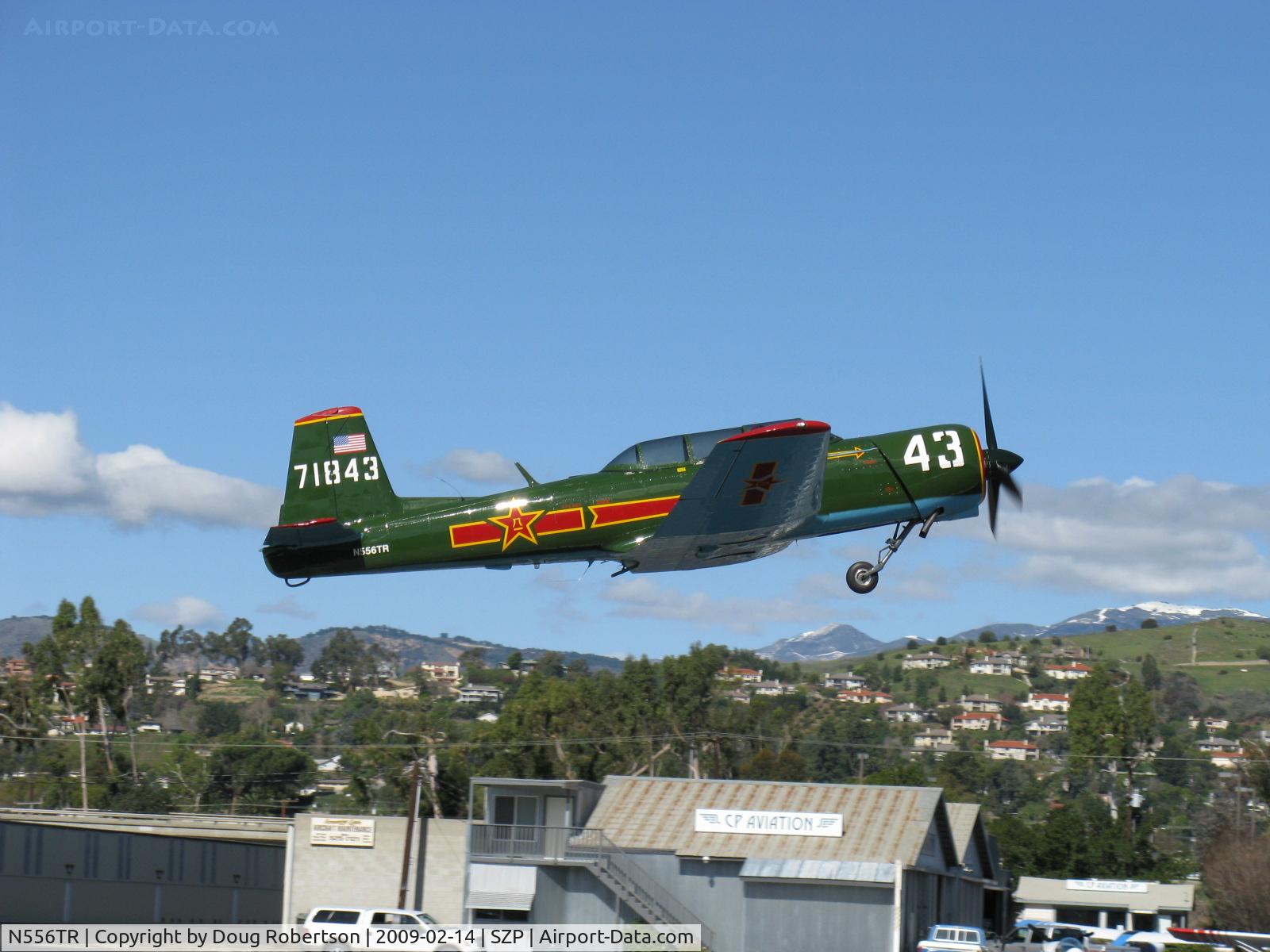 N556TR, 1968 Nanchang CJ-6A C/N 2432060, 1968 Nanchang China CJ-6A, Vedeneev (Ivchenko) MP-14 9 cylinder 360 Hp radial upgrade conversion, takeoff climb Rwy 04 suckin' em up. Winner-Best Nanchang China CJ-6A EAA Airventure 2009. Winner-Warbird Preservation Award EAA AirVenture 2010.