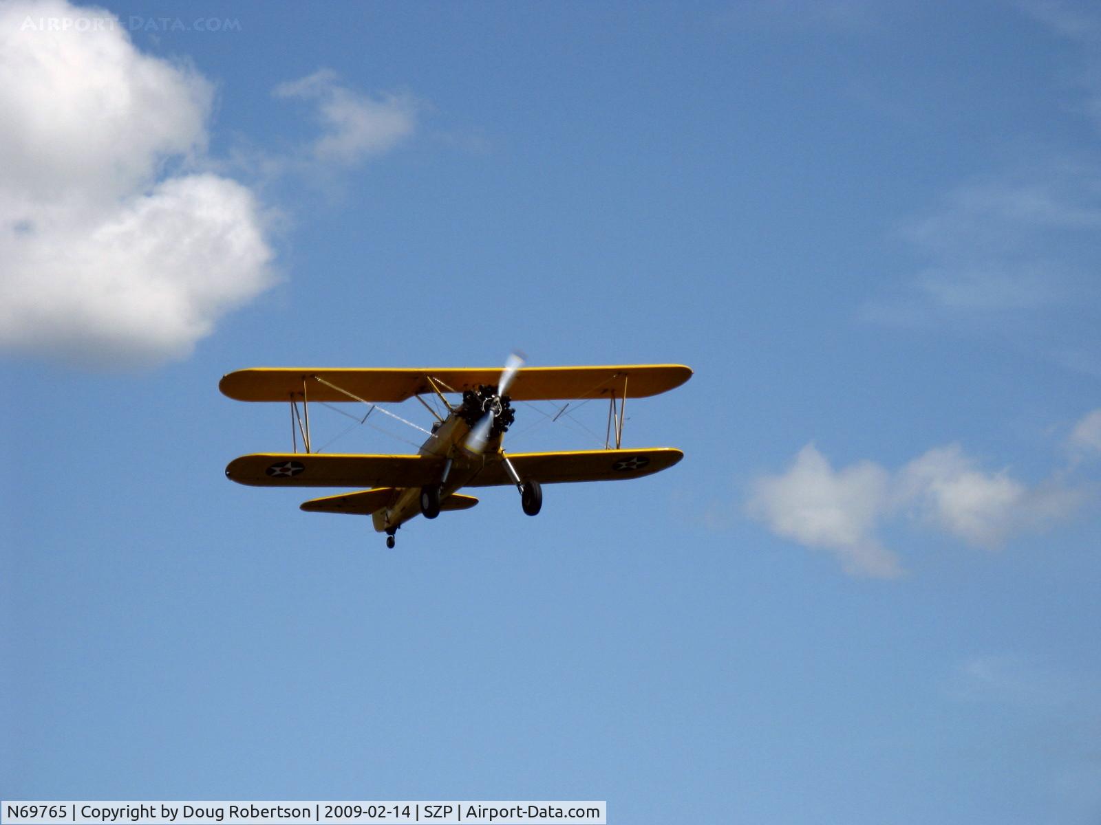 N69765, 1941 Boeing A75N1 (PT17) C/N 75-1044, 1941 Boeing Stearman A74N1 (PT-17 KAYDET), Lycoming R680 225 Hp, takeoff climb Rwy 22