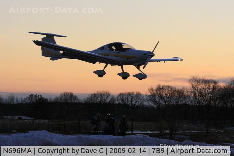 N696MA, 2004 Diamond DA-20-C1 C/N C0296, C1 Eclipse on final at sunset