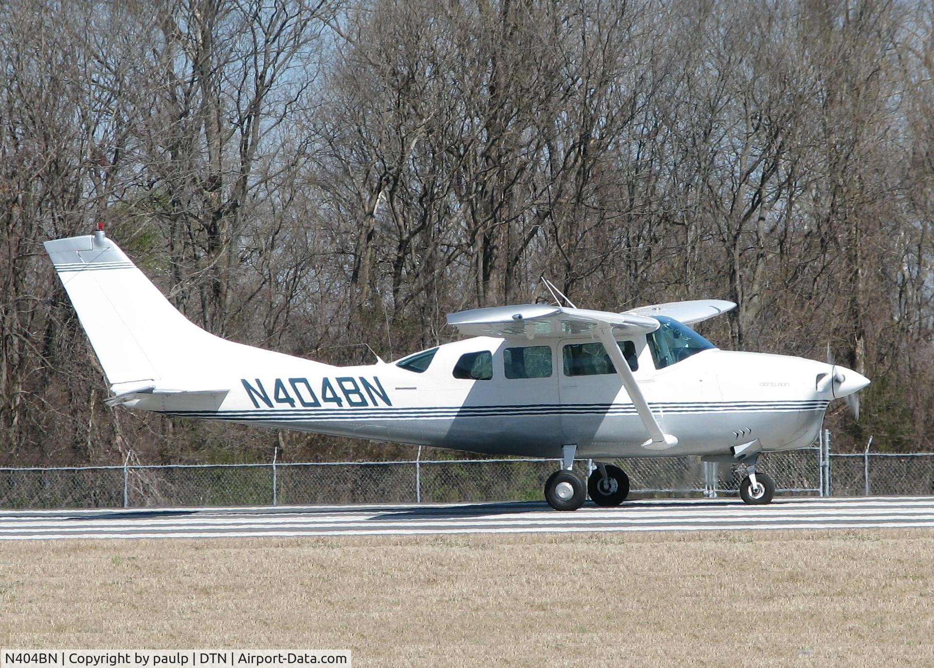 N404BN, 1965 Cessna 210E Centurion C/N 21058705, taking off from runway 14 at the Downtown Shreveport airport.