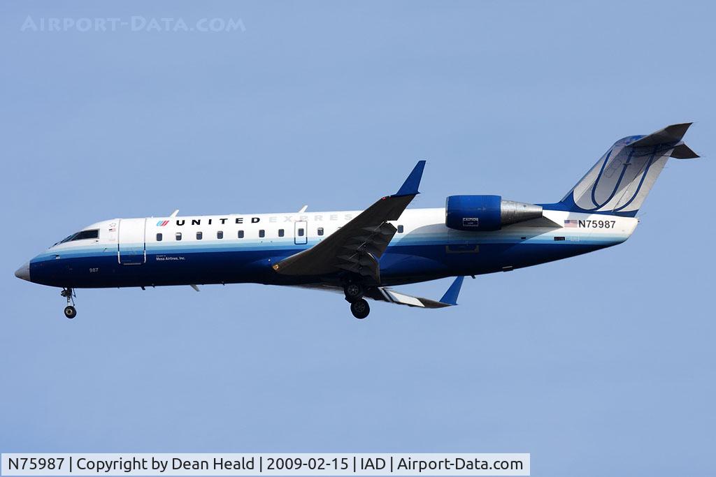N75987, 2000 Bombardier CRJ-200ER (CL-600-2B19) C/N 7405, United Express (Mesa Airlines) N75987 (FLT ASH7327) from Manchester (KMHT) on short-final to RWY 1R.