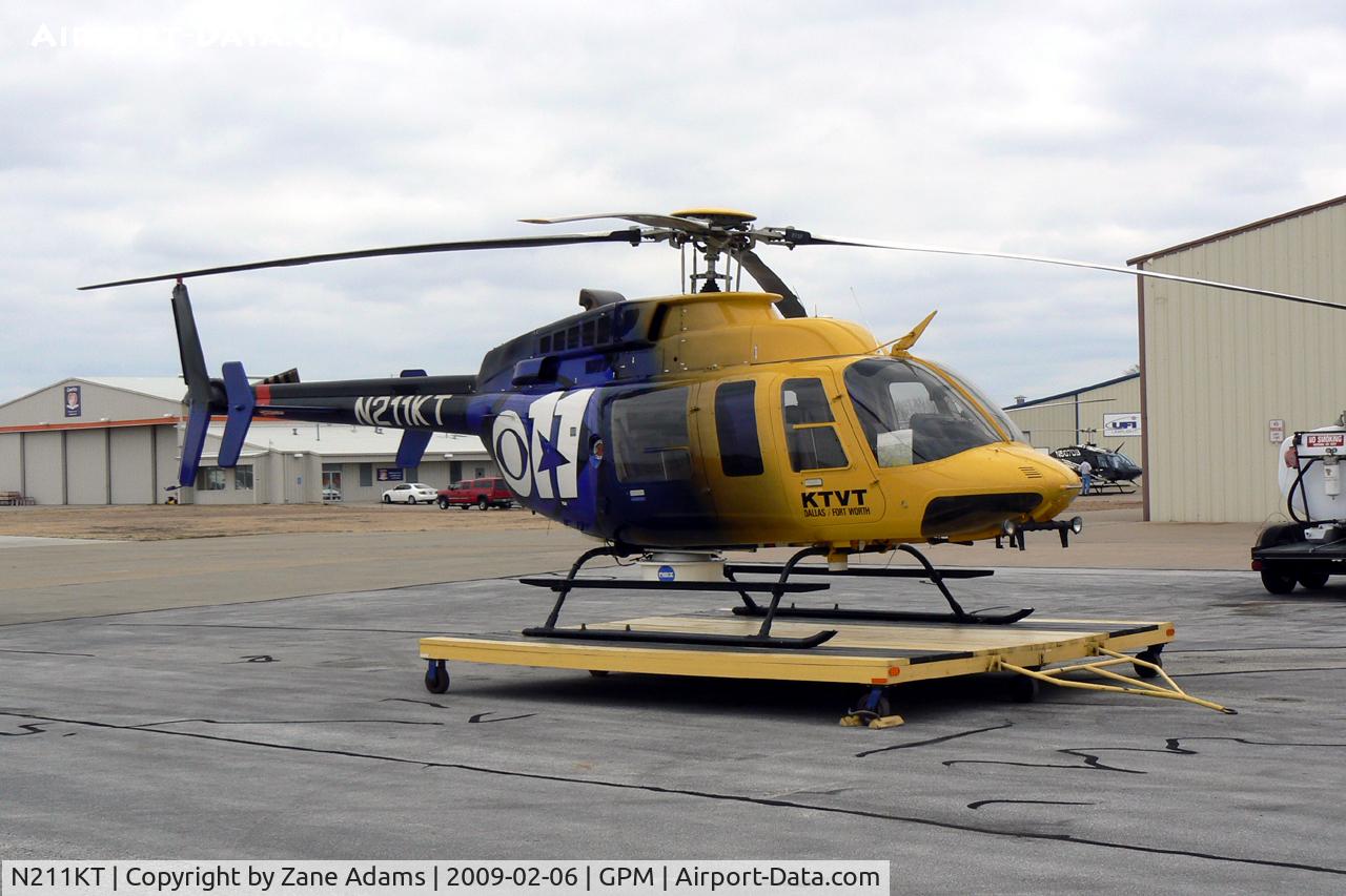 N211KT, 1997 Bell 407 C/N 53162, KTTV CBS Channel 11 DFW TV helicopter at Grand Prairie - The TV Station will no longer be using this aircraft. It is seen here without the camera on the nose and is just moments from departing under new ownership.