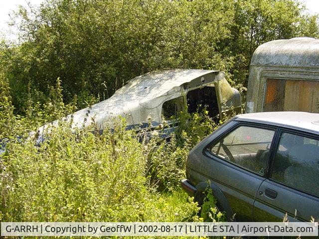 G-ARRH, 1961 Cessna 175B Skylark C/N 175-57000, G-ARRH Cessna 175B. A sad end for this classic Cessna, dumped in the bushes at Little Staughton. Photographed in 2002