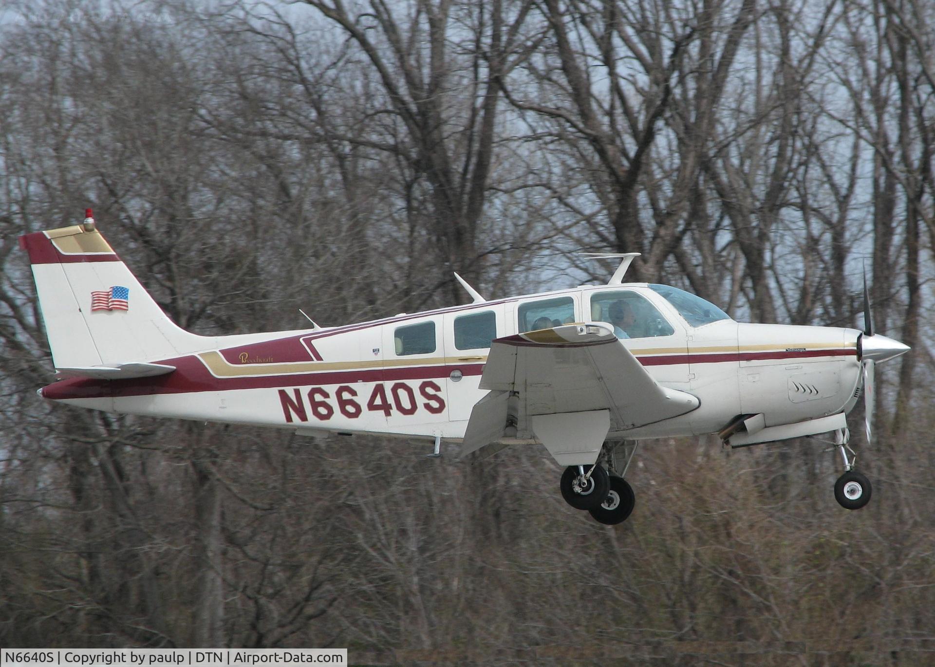 N6640S, 1976 Beech A36 Bonanza 36 C/N E-804, About to touch down on 14 at the Downtown Shreveport airport.