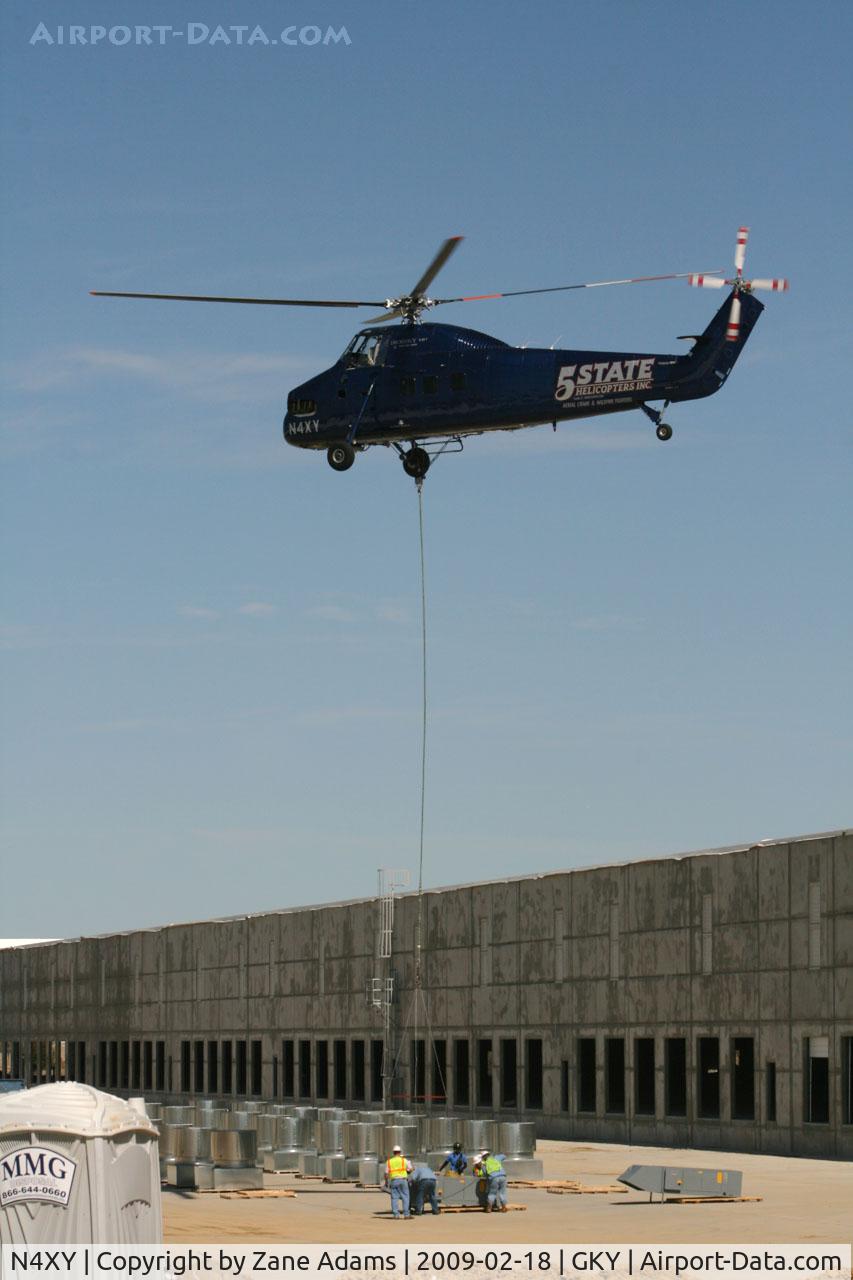 N4XY, 1957 Sikorsky S-58BT C/N 58700, 5 State Helicopters Inc. S-58BT doing a HVAC lift onto a new warehouse near the airport in Arlington, TX
