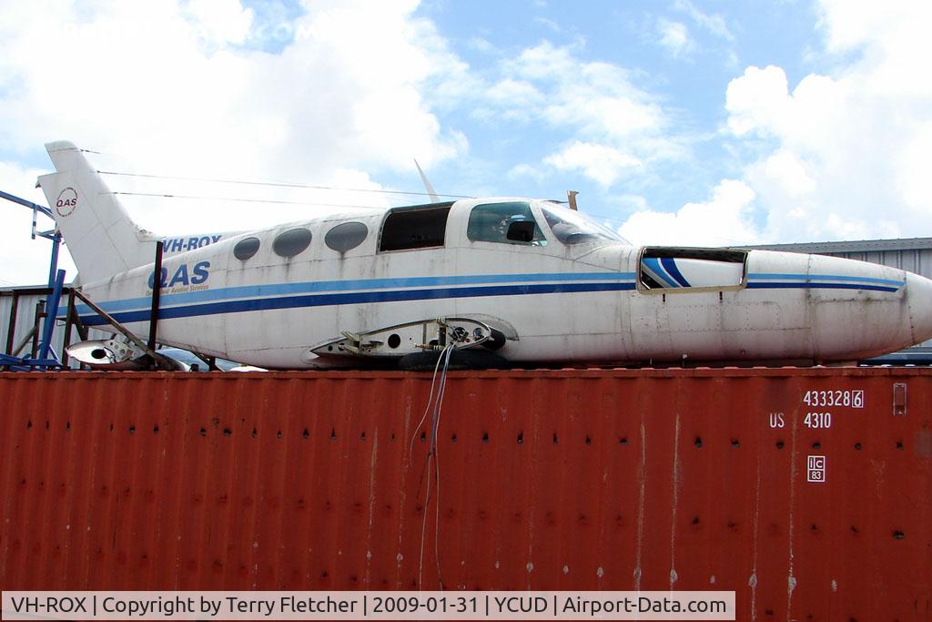 VH-ROX, 1969 Cessna 402A C/N 402A-0123, Cessna 402A now sits WFU on top of a container at Caloundra