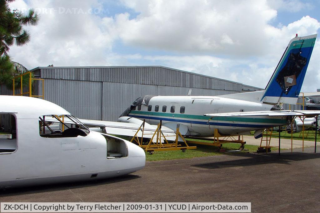 ZK-DCH, 1981 Embraer EMB-110P1 Bandeirante C/N 110.364, Two Emb110 frames sit outside the Queensland Insitute for Aviation Engineering at Caloundra, Queensland Australia - ZK-DCH (white) & ZK-KIP ex NZ Airlink