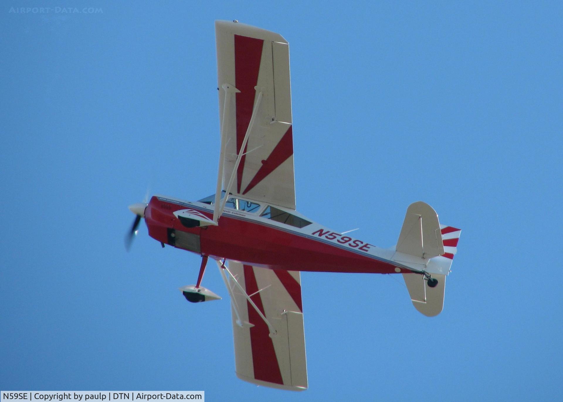 N59SE, 2005 American Champion 8KCAB Super Decathlon C/N 1004-2005, Flying over the Downtown Shreveport airport.