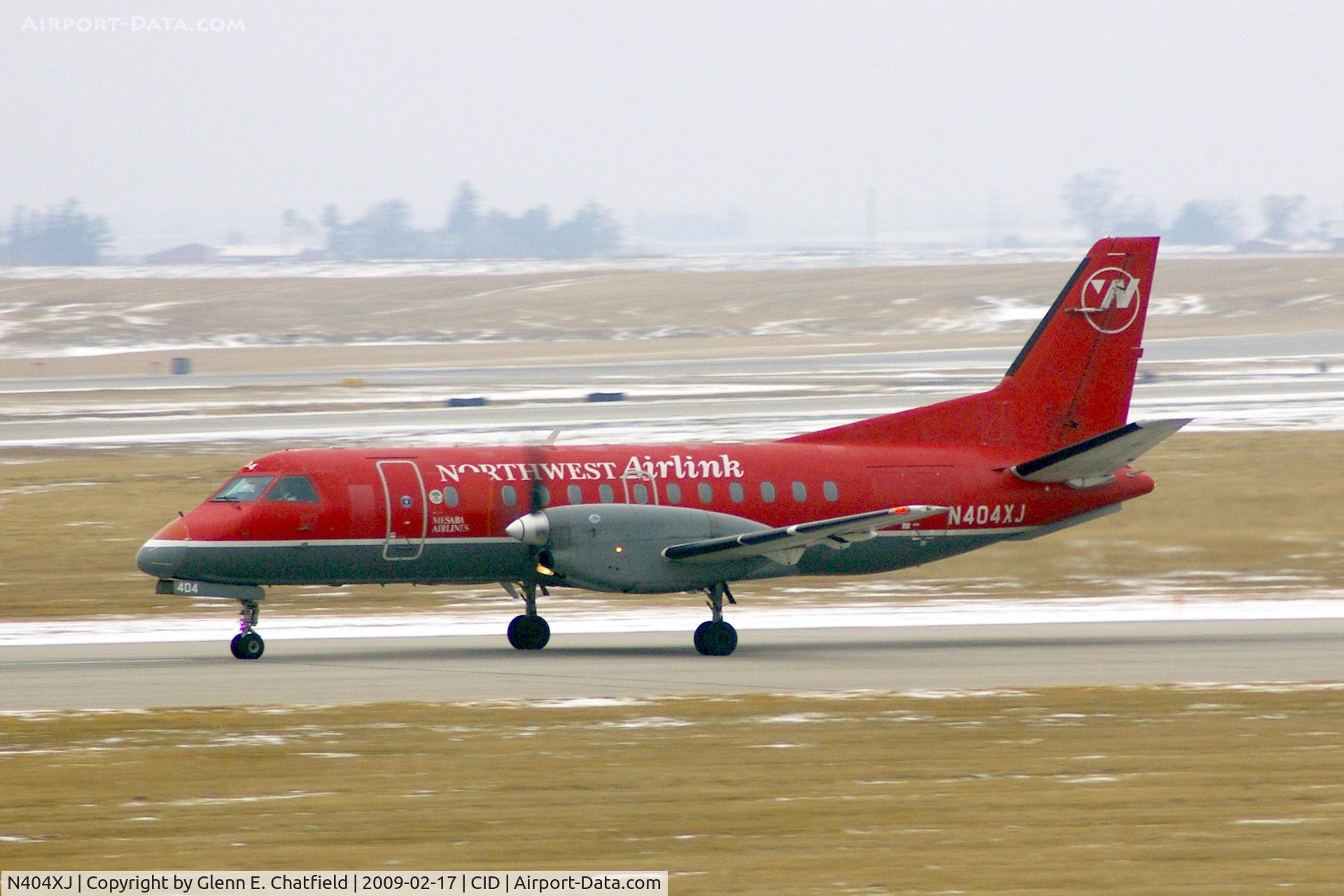 N404XJ, Saab 340B C/N 340B404, On take-off roll Runway 13, seen from my office window.