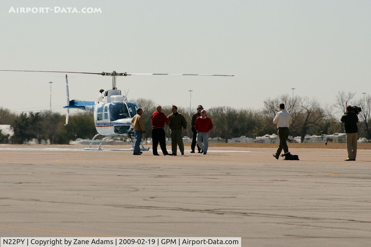 N22PY, 1980 Bell 206B JetRanger III C/N 3136, At Grand Prairie Municipal - Don't know who these guys are...Cameras and handshakes all around...