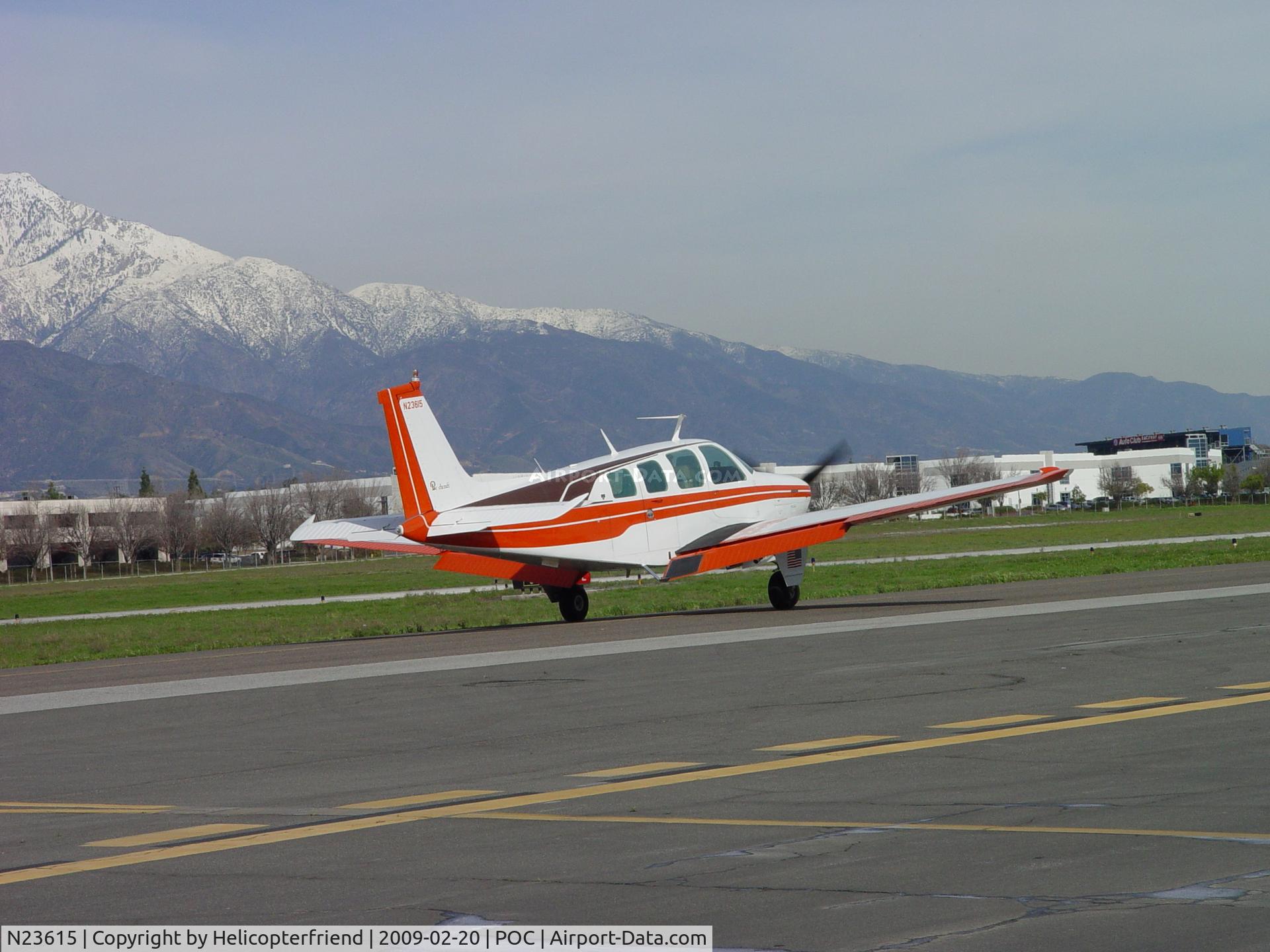 N23615, 1977 Beech A36 Bonanza 36 C/N E-1191, Taxiing to Runway 26L at Brackett