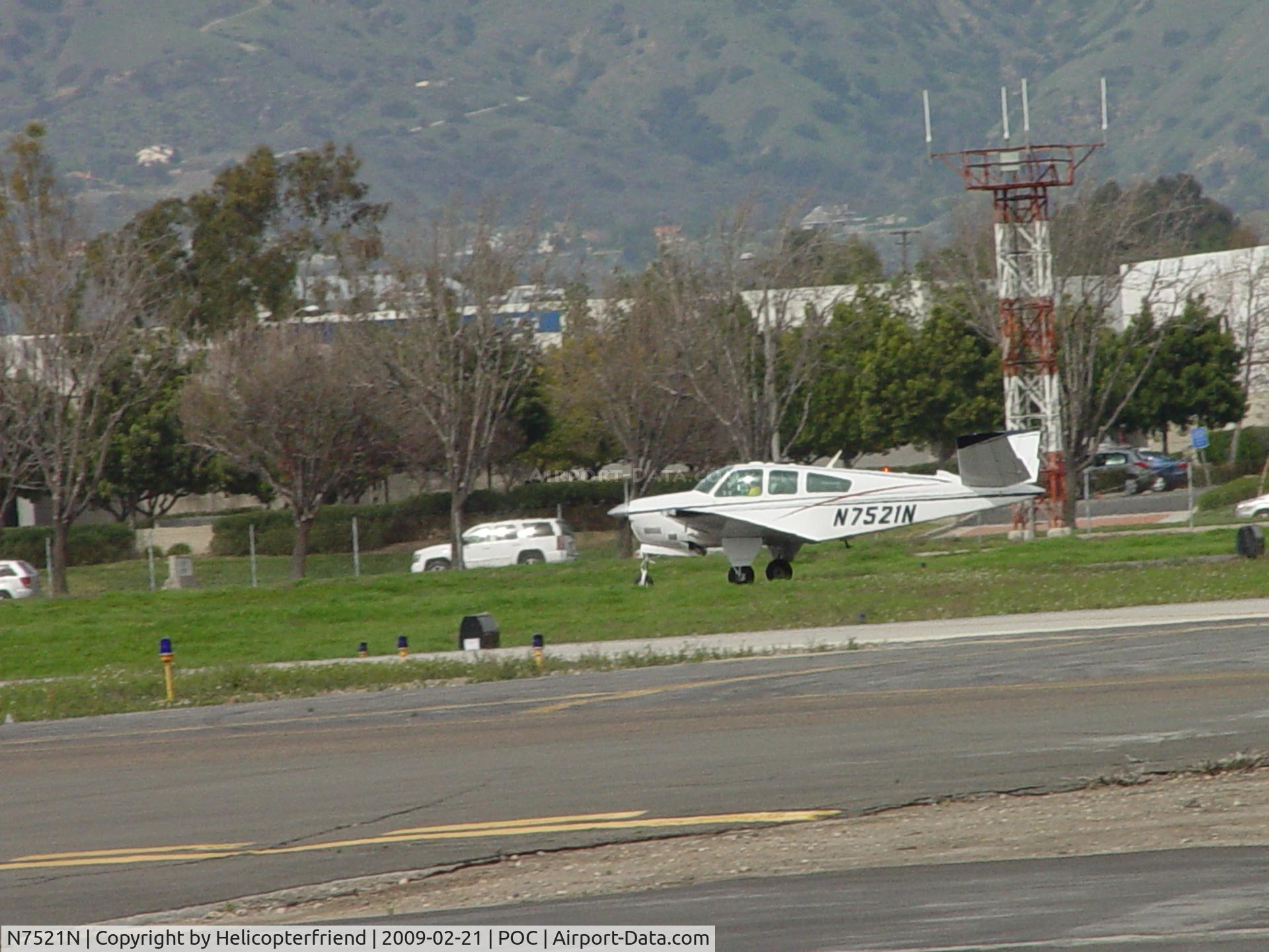 N7521N, 1968 Beech V35A Bonanza C/N D-8844, Rolling westbound for take off 26R