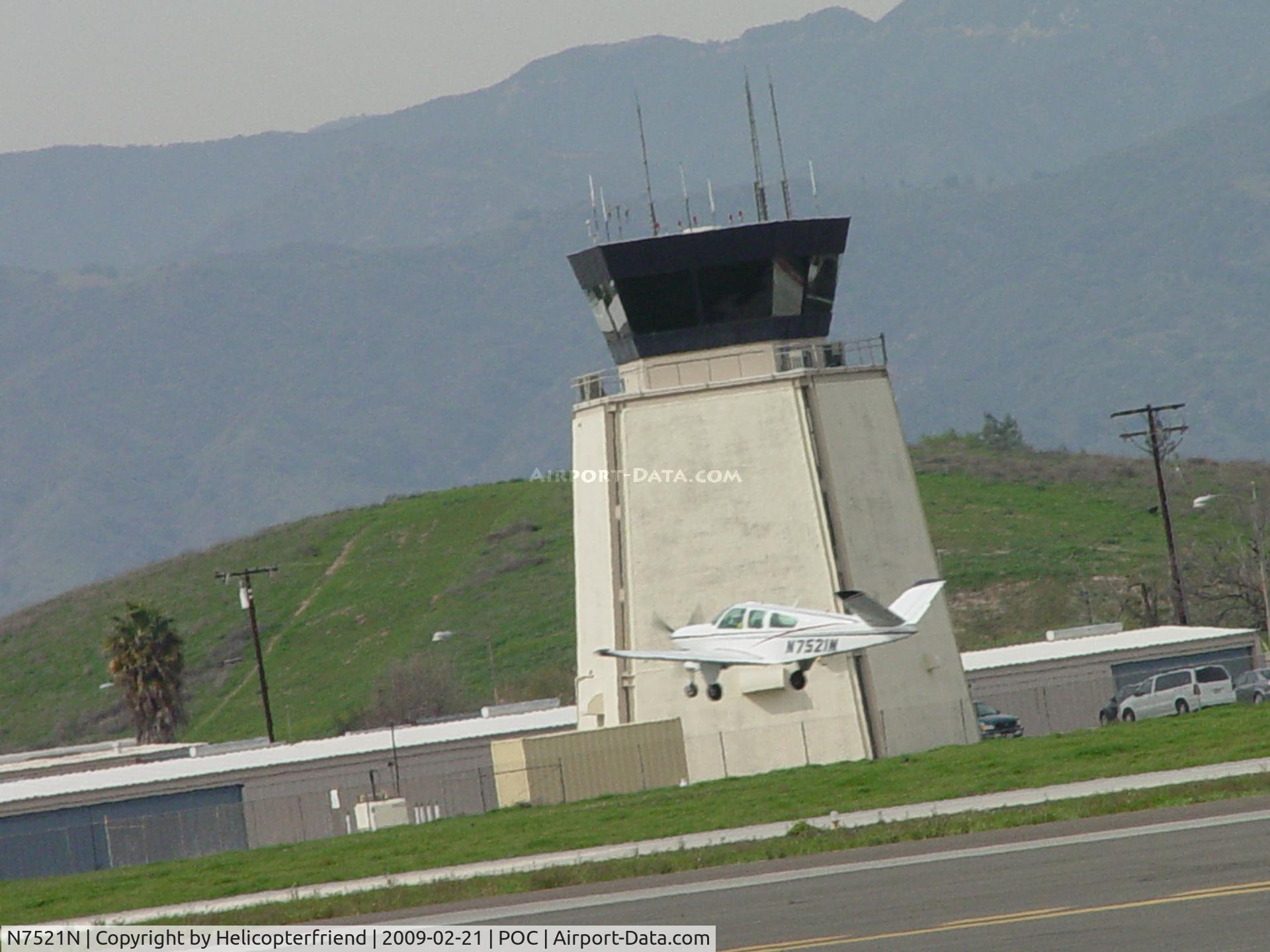 N7521N, 1968 Beech V35A Bonanza C/N D-8844, Airbourne passing Brackett Tower westbound from 26R