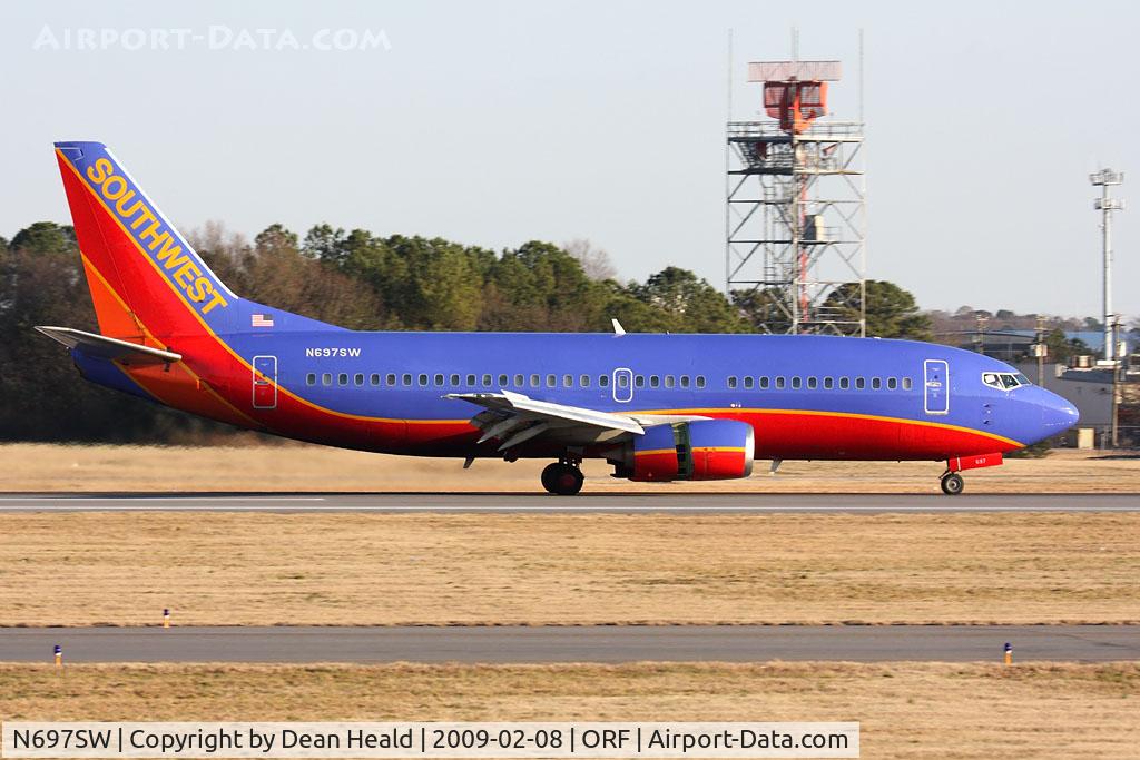 N697SW, 1988 Boeing 737-3TO C/N 23838, Southwest Airlines N697SW (FLT SWA103) rolling out on RWY 23 after arrival from Chicago Midway Int'l (KMDW).