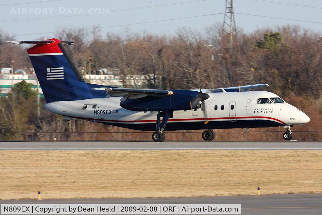 N809EX, 1991 Boeing DHC-8-102 C/N 302, US Airways Express (Piedmont Airlines) N809EX (FLT PDT 4171) from New York La Guardia (KLGA) rolling out on RWY 23 after landing.