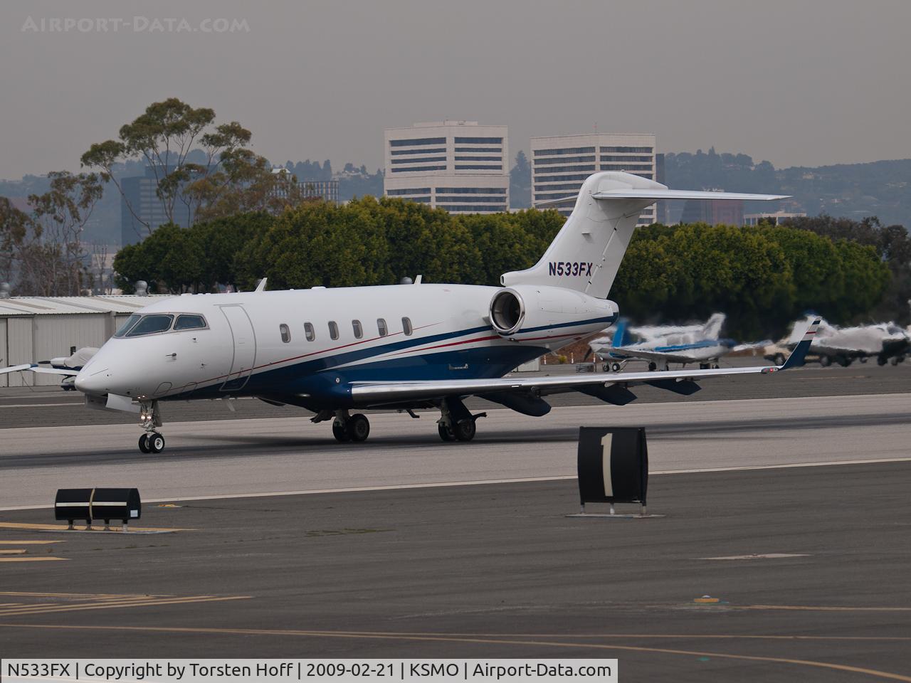 N533FX, 2007 Bombardier Challenger 300 (BD-100-1A10) C/N 20160, N533FX departing from RWY 21