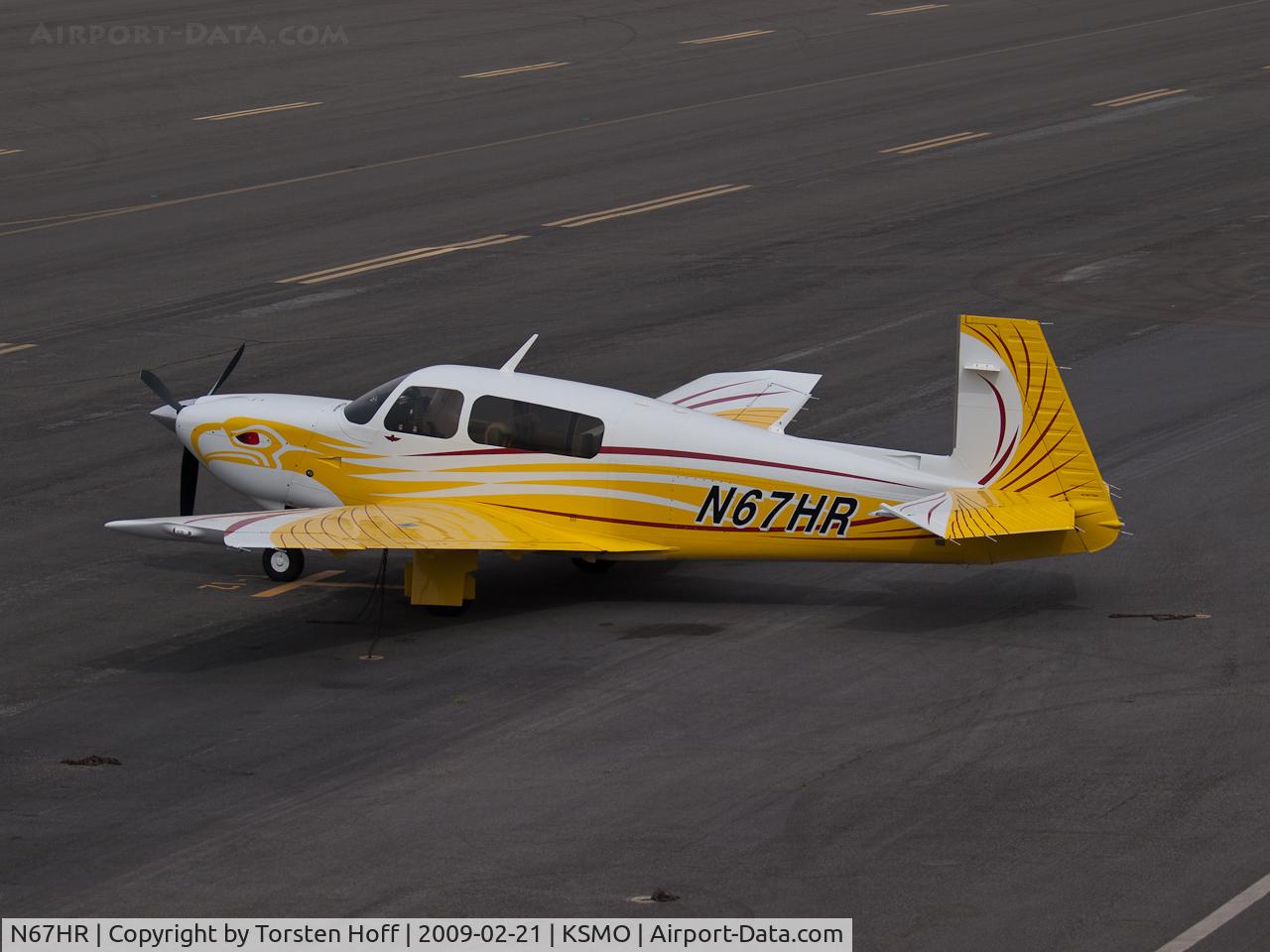 N67HR, 2006 Mooney M20TN Acclaim C/N 31-0010, N67HR parked at KSMO. What an eye-catching paintjob, I would have loved to get a better angle or see her in action.