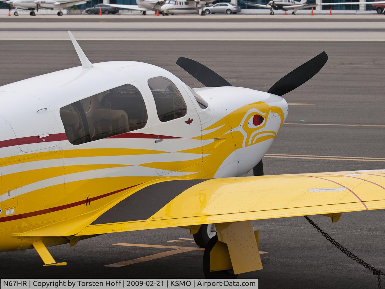 N67HR, 2006 Mooney M20TN Acclaim C/N 31-0010, N67HR parked at KSMO. What an eye-catching paintjob, I would have loved to get a better angle or see her in action.