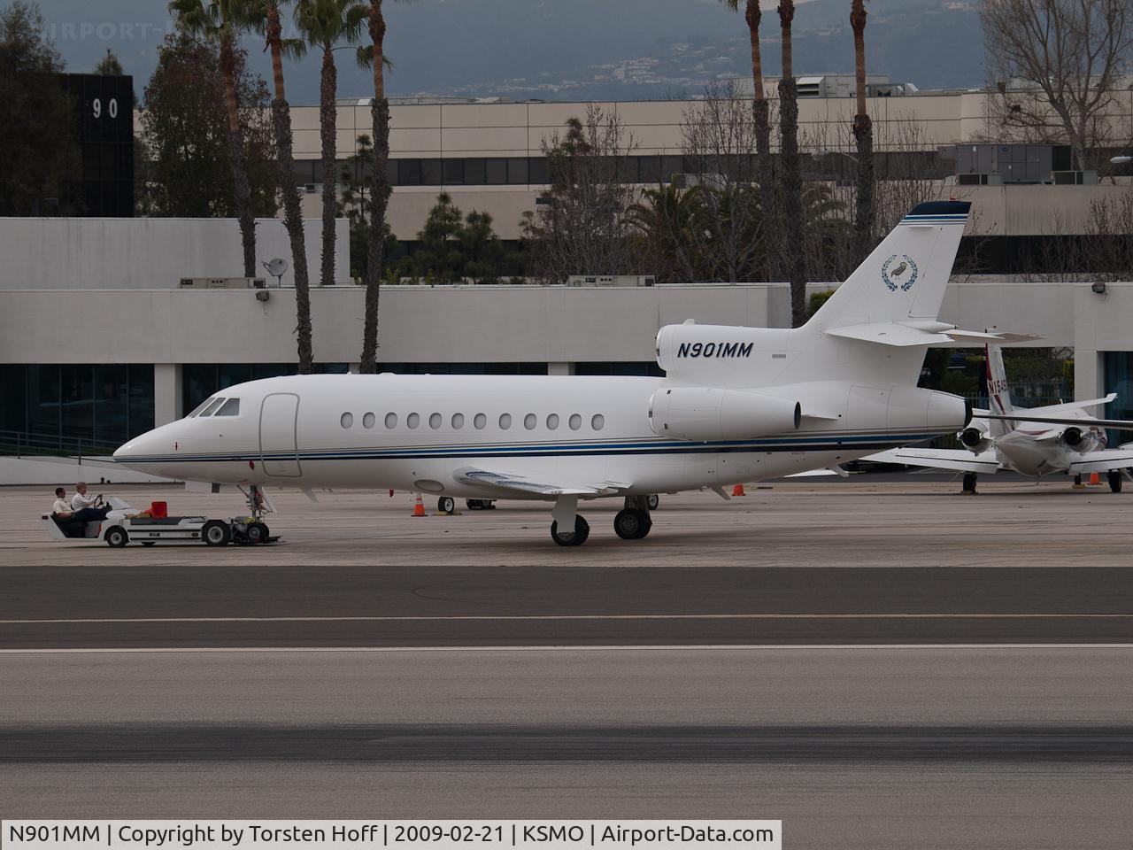 N901MM, 1997 Dassault Falcon 900EX C/N 21, N901MM being moved in preparation for a late afternoon departure