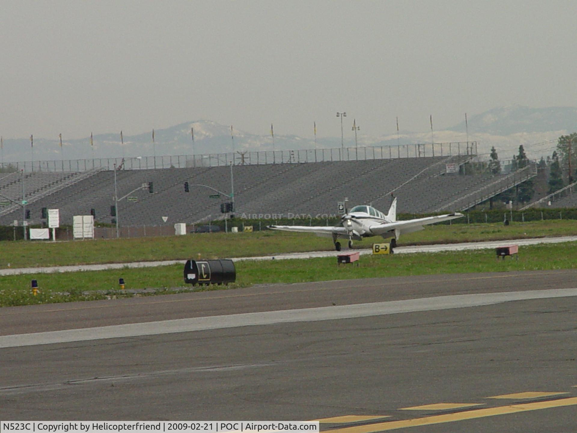 N523C, 1998 Raytheon Aircraft Company A36 Bonanza C/N E-3161, Touching down at Brackett