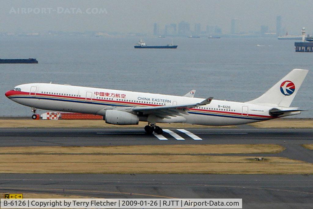 B-6126, 2006 Airbus A330-343X C/N 777, China Eastern A330 lifts from Haneda