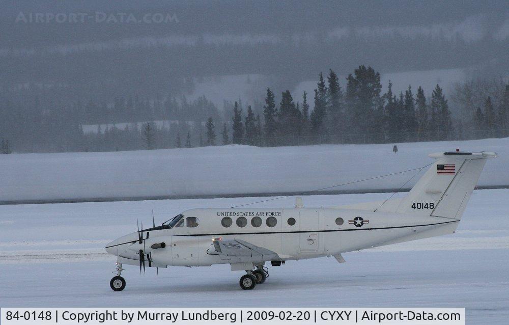 84-0148, 1984 Beech C-12F Huron C/N BL-078, USAF 40148, a Beech C-12F Huron (Super King Air B200C) arrives in Whitehorse on a snowy morning for the Sourdough Rendezvous Air Show.