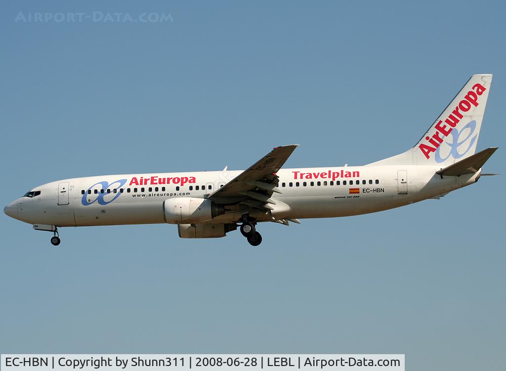 EC-HBN, 1999 Boeing 737-85P C/N 28383, Landing rwy 25R with additional 'Travelplan' stickers
