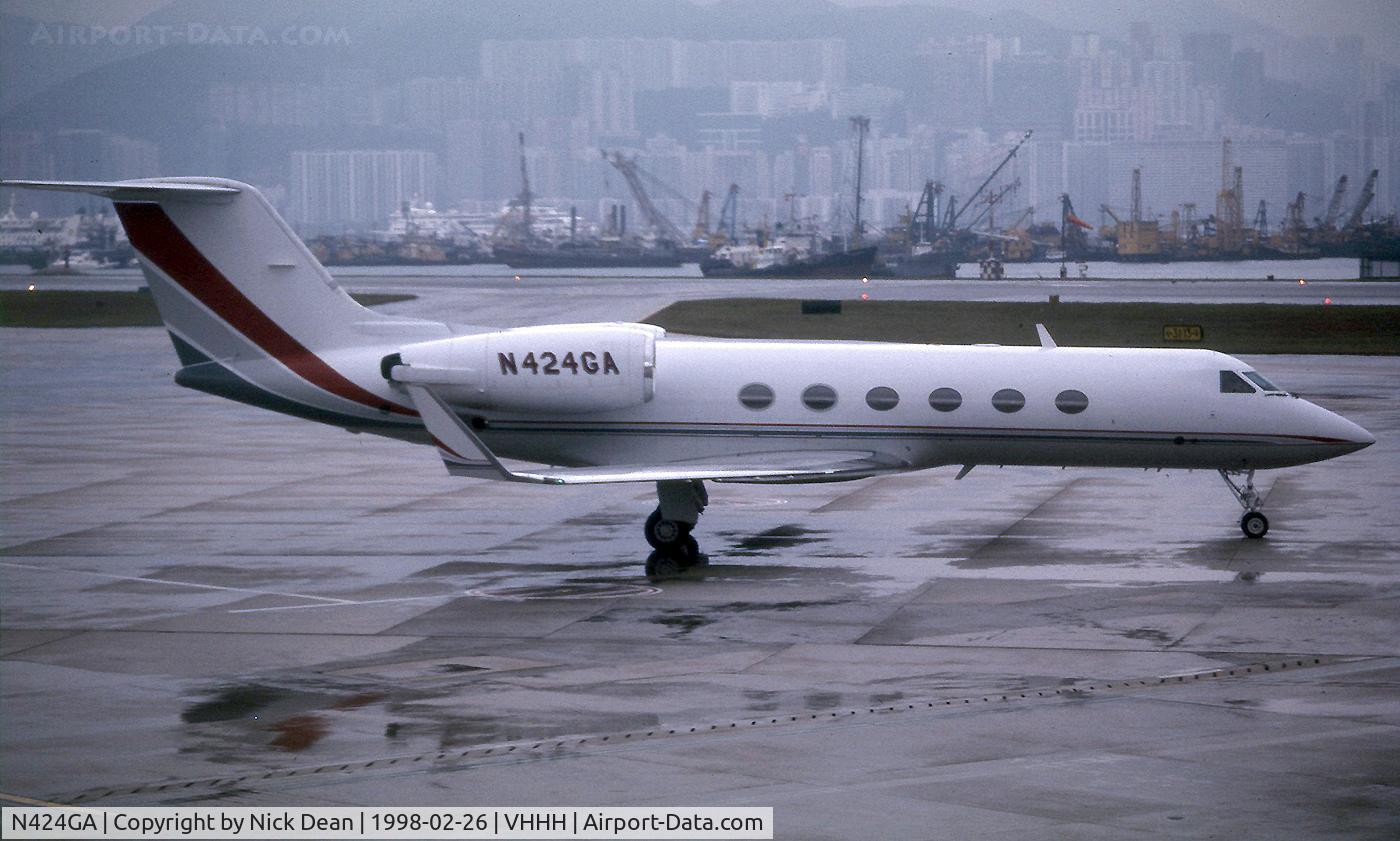 N424GA, 1986 Gulfstream Aerospace Gulfstream IV C/N 1004, VHHH (Kai Tak) Taken from the window of a UA lump taxying for departure back to KSFO