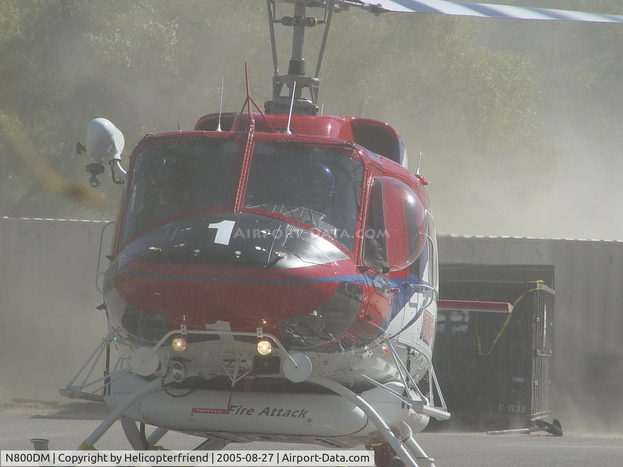 N800DM, 1980 Bell 212 C/N 31147, Landing at CRPOA Conference and getting tangled in yellow caution tape on right skid
