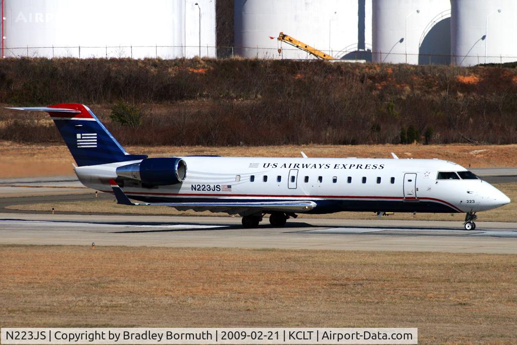 N223JS, 2004 Bombardier CRJ-200ER (CL-600-2B19) C/N 7892, Taken from the overlook on the west side of the Charlotte Douglas International Airport.