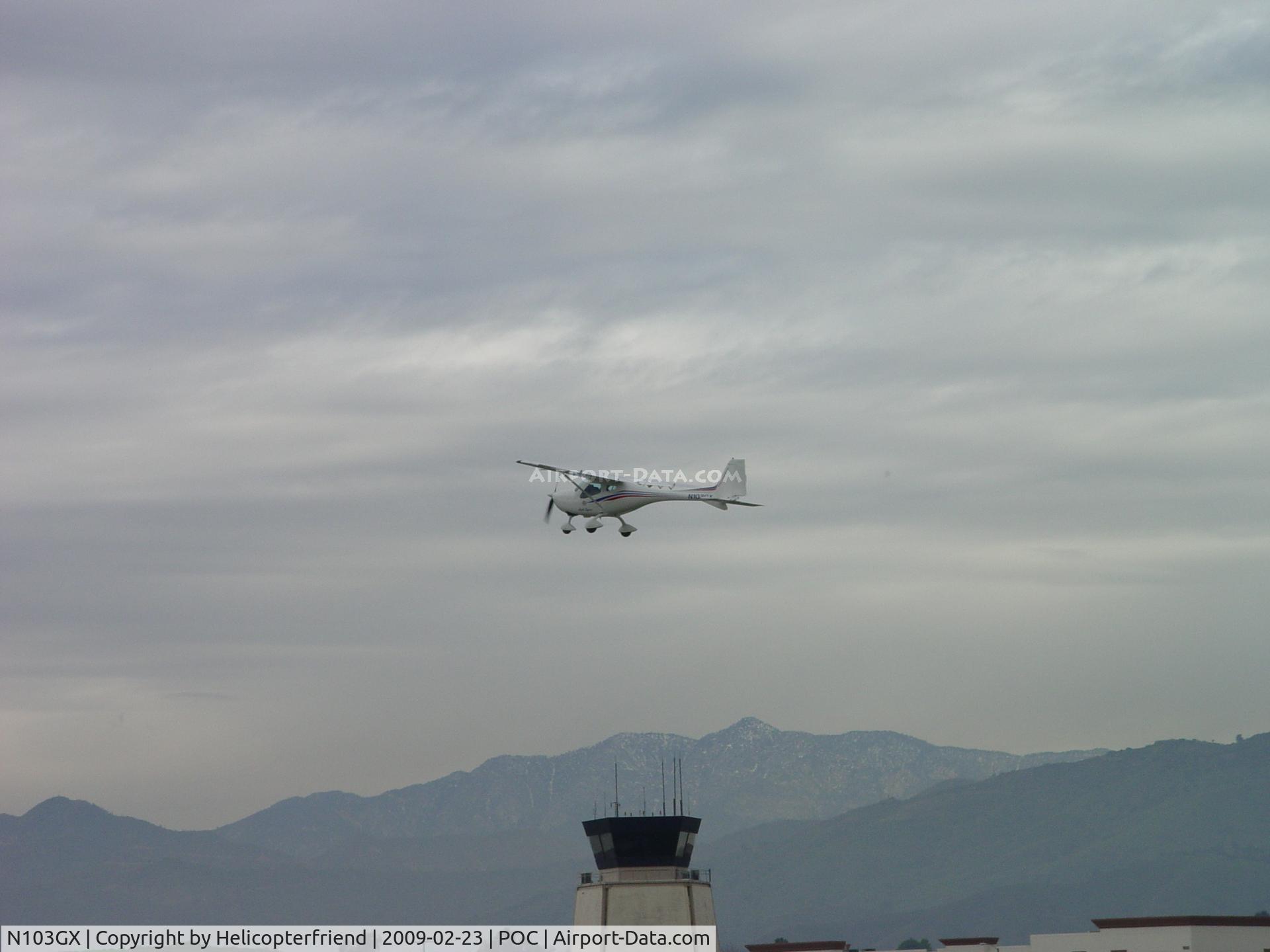 N103GX, Remos GX C/N 287, Up and out of here, passing tower