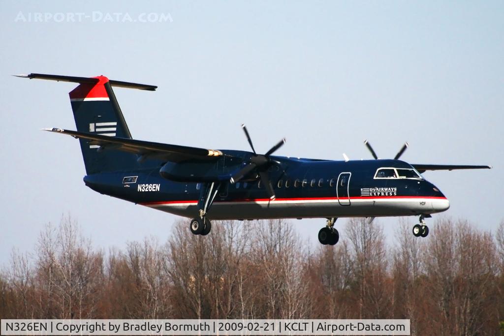 N326EN, 1990 De Havilland Canada DHC-8-311 Dash 8 C/N 234, Taken from the overlook on the west side of the Charlotte Douglas International Airport.