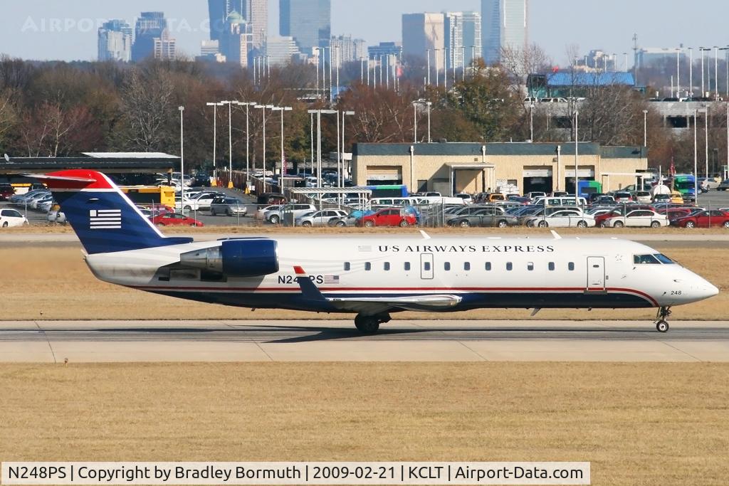 N248PS, 2004 Bombardier CRJ-200ER (CL-600-2B19) C/N 7925, Taken from the overlook on the west side of the Charlotte Douglas International Airport.