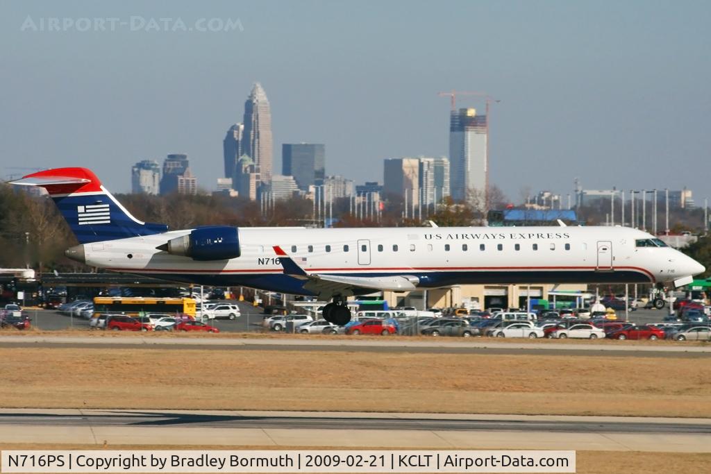 N716PS, 2004 Bombardier CRJ-701 (CL-600-2C10) Regional Jet C/N 10171, Taken from the overlook on the west side of the Charlotte Douglas International Airport.